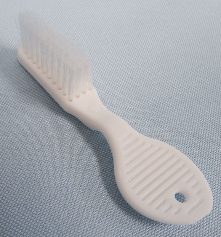 small toothbrush with thumb handle